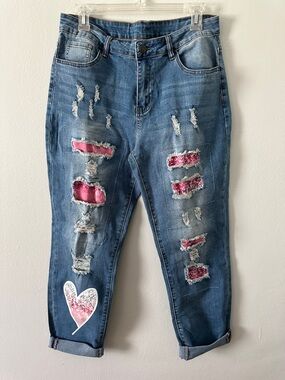 Distressed Blue Jeans with Pink Patches